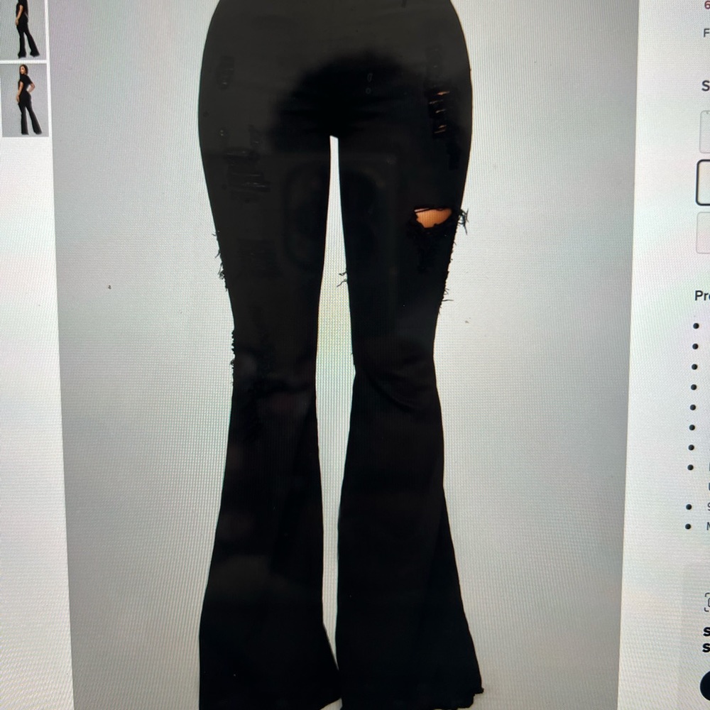 Mind of Her Own Flare Jeans. Distressed in front and back.